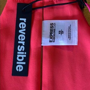 Express Tops - Pink reversible racerback cami NWT. Never worn. Express Tops - Pink reversible racerback cami NWT. Never worn.